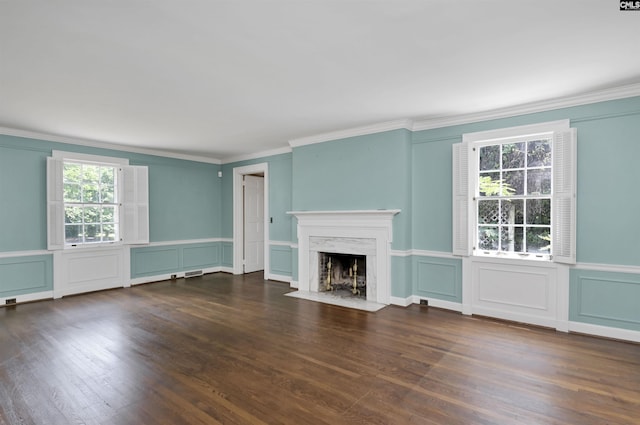 723 Hampton Hill Rd, Columbia, SC 29209 - unfurnished living room featuring healthy amount of natural light, a decorative wall, ornamental molding, a premium fireplace, and dark wood finished floors