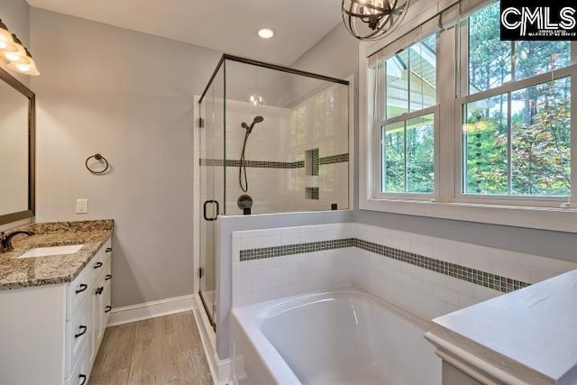 120 Mclaw Ln, Gilbert, SC 29054 - full bath featuring a bath, vanity, healthy amount of natural light, a stall shower, and recessed lighting