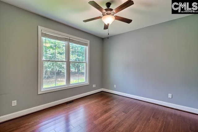 120 Mclaw Ln, Gilbert, SC 29054 - unfurnished room featuring baseboards, dark wood-type flooring, and a ceiling fan