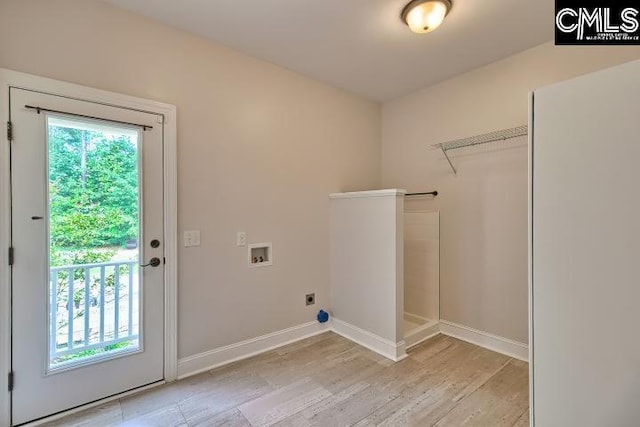 120 Mclaw Ln, Gilbert, SC 29054 - laundry area featuring baseboards, washer hookup, light wood-style flooring, and electric dryer hookup