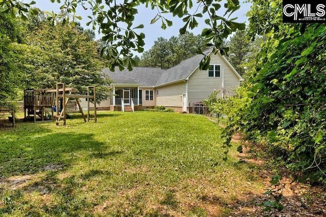 120 Mclaw Ln, Gilbert, SC 29054 - rear view of property with a playground, a yard, and crawl space
