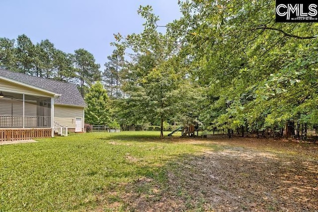120 Mclaw Ln, Gilbert, SC 29054 - view of green lawn featuring a playground and a sunroom