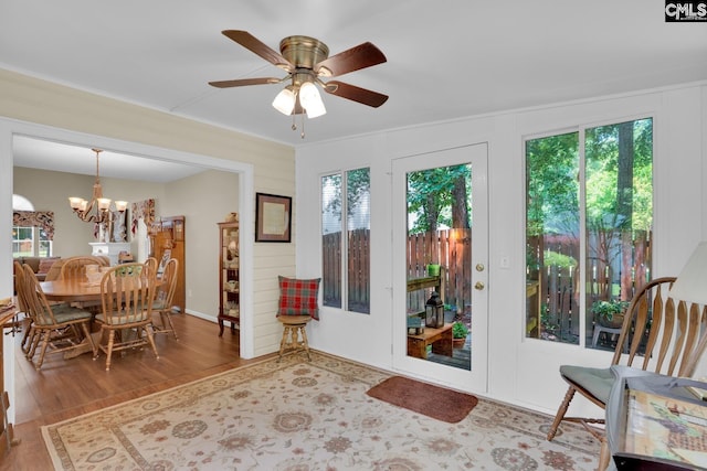 24 Stoney Pointe Dr, Chapin, SC 29036 - dining space featuring wood finished floors, a chandelier, ceiling fan, and ornamental molding