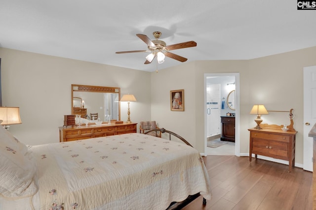24 Stoney Pointe Dr, Chapin, SC 29036 - bedroom featuring wood finished floors, baseboards, ensuite bath, and ceiling fan