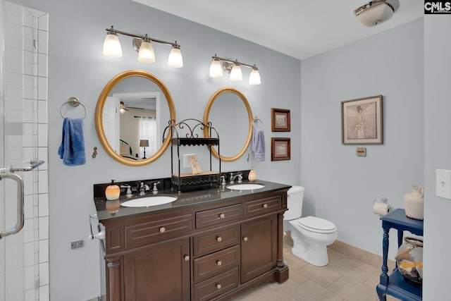 24 Stoney Pointe Dr, Chapin, SC 29036 - bathroom with toilet, tile patterned flooring, double vanity, ceiling fan, and a shower