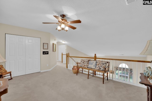 24 Stoney Pointe Dr, Chapin, SC 29036 - sitting room featuring a ceiling fan, carpet flooring, vaulted ceiling, and an upstairs landing