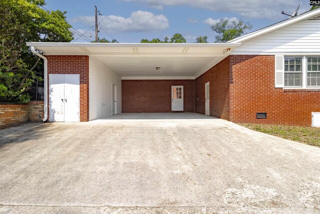 1109 F Ave, Cayce, SC 29033 - view of vehicle parking with driveway and a carport