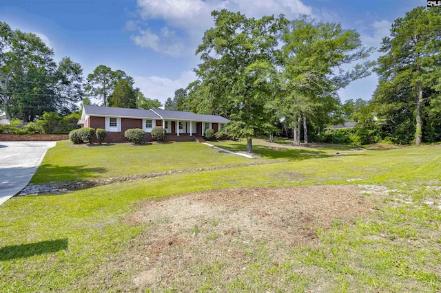 1109 F Ave, Cayce, SC 29033 - single story home with a front yard and concrete driveway