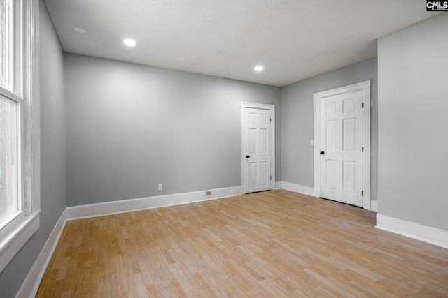 3715 Palmetto Ave, Columbia, SC 29203 - unfurnished room featuring baseboards, light wood-style floors, recessed lighting, and healthy amount of natural light