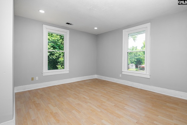 3715 Palmetto Ave, Columbia, SC 29203 - unfurnished room with light wood finished floors, baseboards, and recessed lighting