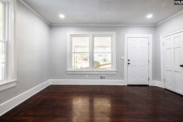 3715 Palmetto Ave, Columbia, SC 29203 - entrance foyer with ornamental molding, healthy amount of natural light, dark wood-type flooring, baseboards, and recessed lighting