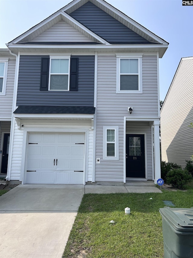 739 Jacobs Mill Pond Rd Unit 21, Elgin, SC 29045 - view of front facade featuring a garage, driveway, and a front lawn