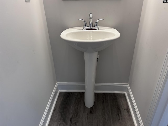 739 Jacobs Mill Pond Rd Unit 21, Elgin, SC 29045 - bathroom featuring wood finished floors, a sink, and baseboards