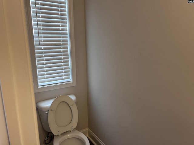 739 Jacobs Mill Pond Rd Unit 21, Elgin, SC 29045 - bathroom with baseboards and toilet