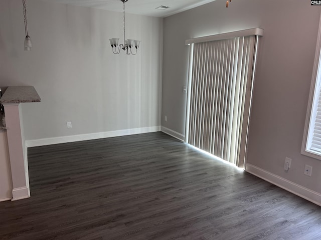 739 Jacobs Mill Pond Rd Unit 21, Elgin, SC 29045 - unfurnished dining area featuring a chandelier, dark wood finished floors, and baseboards