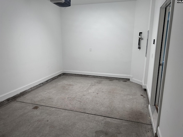 739 Jacobs Mill Pond Rd Unit 21, Elgin, SC 29045 - garage featuring a garage door opener and baseboards