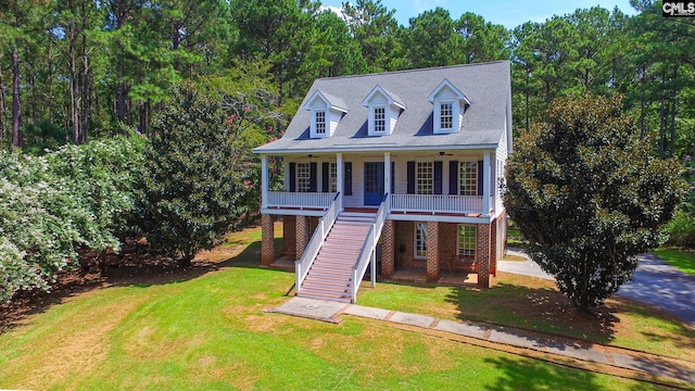 2492 Harbor View Rd, Camden, SC 29020 - view of front of house featuring stairs, covered porch, a front lawn, and ceiling fan