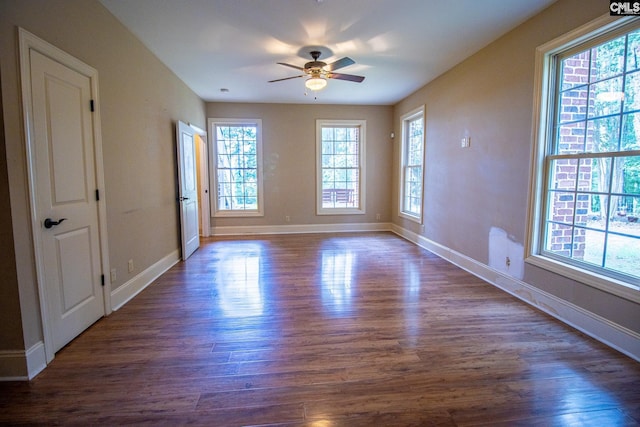 2492 Harbor View Rd, Camden, SC 29020 - unfurnished room with a ceiling fan, dark wood-style flooring, and baseboards