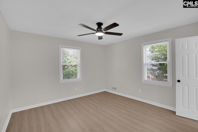 1605 Overhill Rd, Columbia, SC 29223 - spare room featuring wood finished floors, ceiling fan, and baseboards
