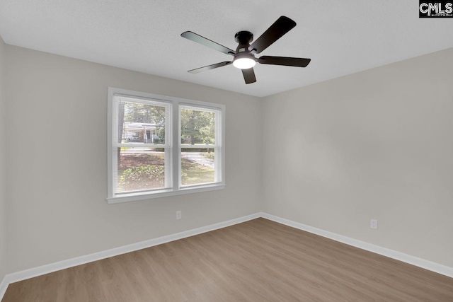1605 Overhill Rd, Columbia, SC 29223 - spare room with light wood finished floors, a ceiling fan, and baseboards