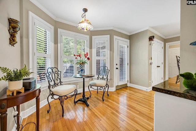 1368 Sunnyhill Dr, Camden, SC 29020 - dining space with light wood-type flooring, baseboards, and crown molding
