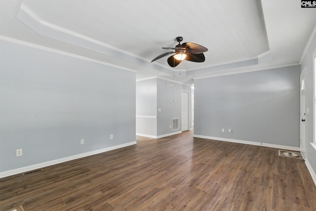 1149 Pond Branch Rd, Gilbert, SC 29054 - unfurnished room with a raised ceiling, ceiling fan, dark wood finished floors, crown molding, and baseboards