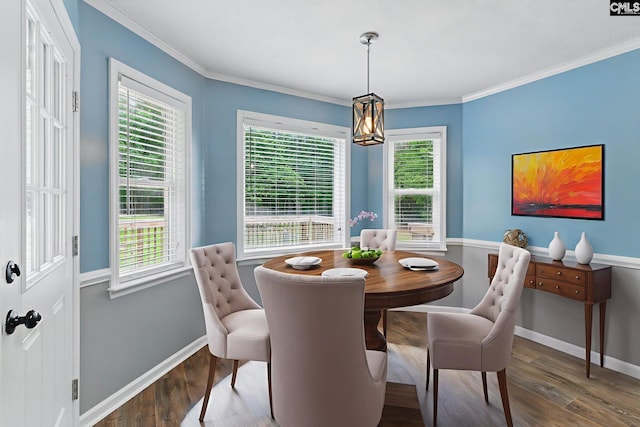 1149 Pond Branch Rd, Gilbert, SC 29054 - dining area with wood finished floors, baseboards, ornamental molding, and a chandelier
