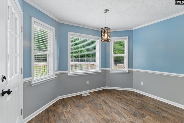 1149 Pond Branch Rd, Gilbert, SC 29054 - unfurnished dining area with dark wood-style floors, a textured ceiling, a chandelier, ornamental molding, and baseboards