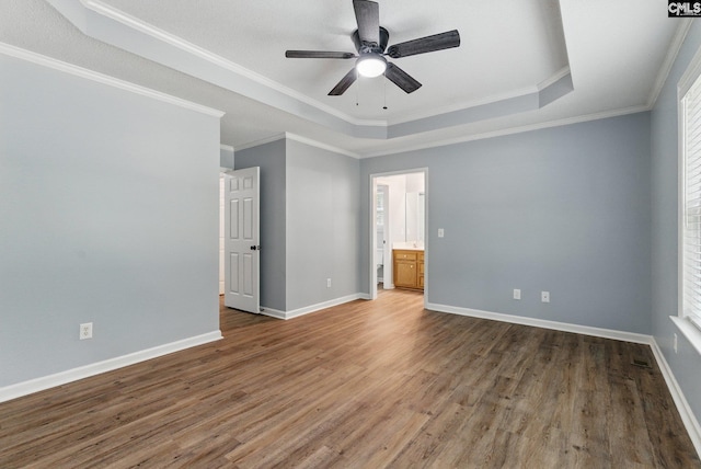 1149 Pond Branch Rd, Gilbert, SC 29054 - unfurnished bedroom featuring a tray ceiling, wood finished floors, baseboards, crown molding, and ensuite bath