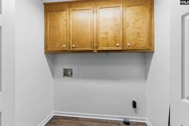 1149 Pond Branch Rd, Gilbert, SC 29054 - washroom featuring cabinet space, washer hookup, baseboards, and dark wood-style flooring