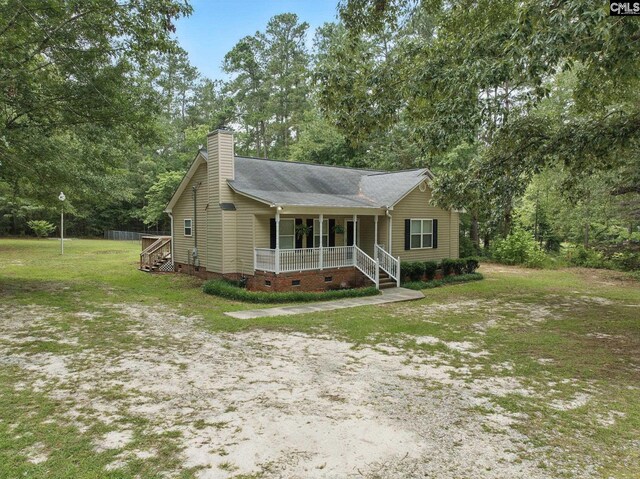 1149 Pond Branch Rd, Gilbert, SC 29054 - ranch-style house with crawl space, a porch, a chimney, roof with shingles, and a front lawn