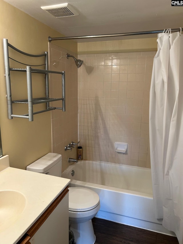 1600 Park Cir Unit 802, Columbia, SC 29201 - full bathroom with vanity, shower / bathtub combination with curtain, toilet, and wood finished floors