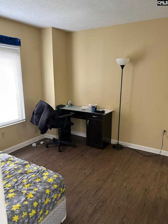 1600 Park Cir Unit 802, Columbia, SC 29201 - home office with dark wood-style floors, a textured ceiling, and baseboards