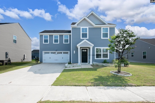 784 Phipps Ln, Columbia, SC 29209 - view of front facade featuring board and batten siding, driveway, a garage, and a front yard