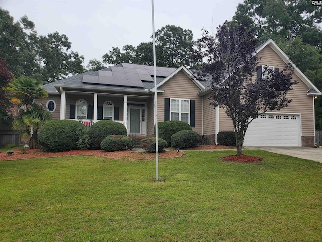 28 Calabash Ln, Elgin, SC 29045 - view of front of house featuring solar panels, covered porch, driveway, a front yard, and a garage