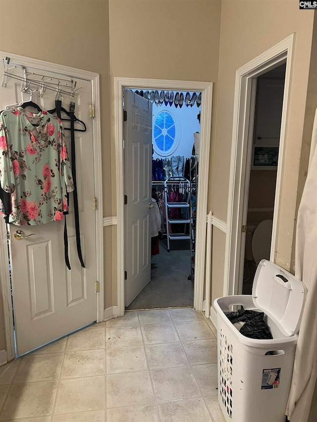 28 Calabash Ln, Elgin, SC 29045 - entryway with baseboards and light tile patterned flooring