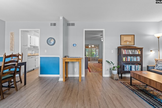 1908 Grays Inn Rd, Columbia, SC 29210 - living room featuring light wood-type flooring and baseboards