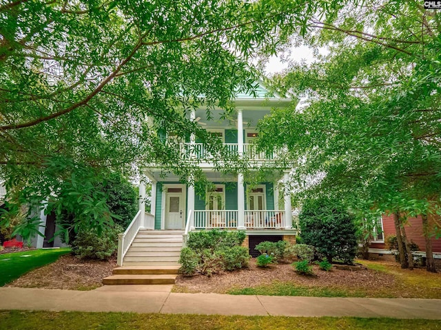 321 Lake Carolina Blvd, Columbia, SC 29229 - obstructed view of property featuring a porch, a balcony, and stairway