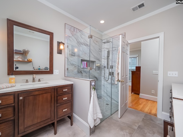 321 Lake Carolina Blvd, Columbia, SC 29229 - full bath with ornamental molding, vanity, a marble finish shower, baseboards, and recessed lighting