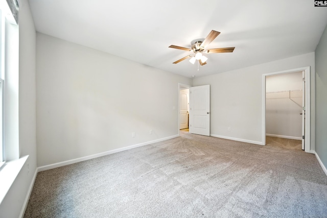 514 Red Taffy Way, Lexington, SC 29073 - unfurnished bedroom with carpet floors, a spacious closet, baseboards, a ceiling fan, and a closet