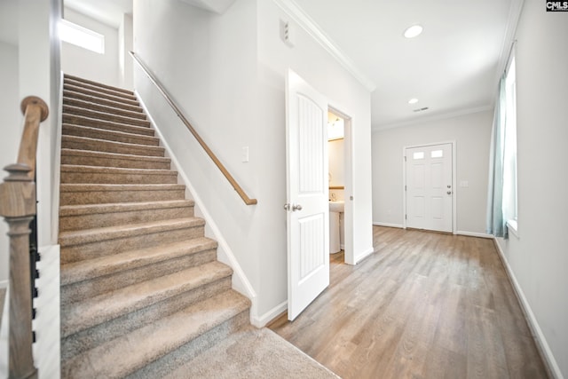 514 Red Taffy Way, Lexington, SC 29073 - staircase featuring ornamental molding, wood finished floors, baseboards, and recessed lighting