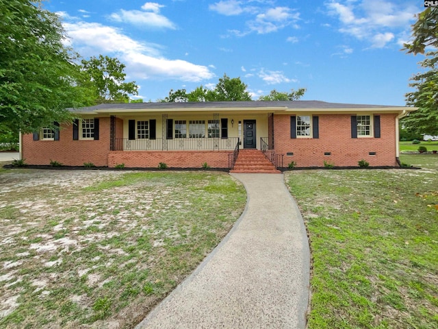 2540 Chatsworth Rd, Columbia, SC 29223 - ranch-style house featuring brick siding, a porch, crawl space, and a front lawn