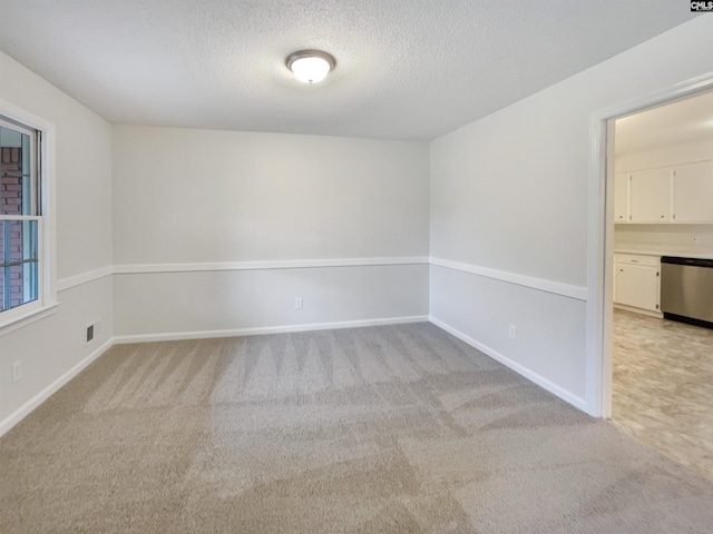 2540 Chatsworth Rd, Columbia, SC 29223 - empty room featuring light carpet, a textured ceiling, and baseboards