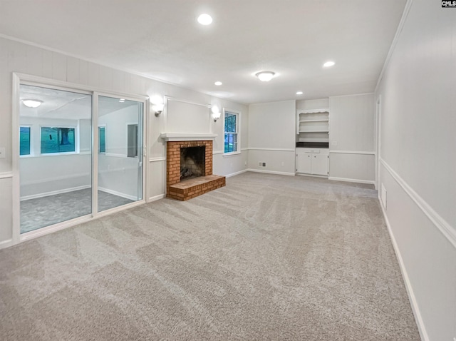 2540 Chatsworth Rd, Columbia, SC 29223 - unfurnished living room featuring carpet floors, recessed lighting, baseboards, a fireplace, and crown molding