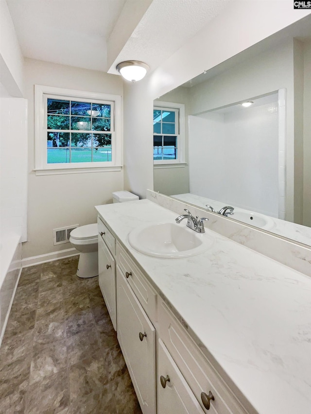 2540 Chatsworth Rd, Columbia, SC 29223 - full bathroom featuring vanity, toilet, and baseboards