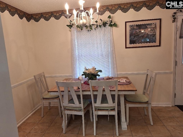 2279TICKLEHIL Tickle Hill Rd, Camden, SC 29020 - dining room with a chandelier, tile patterned floors, and a textured ceiling