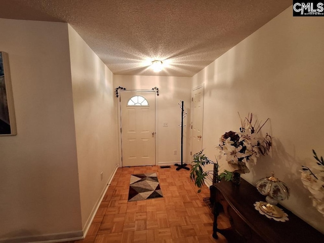 2279TICKLEHIL Tickle Hill Rd, Camden, SC 29020 - doorway to outside with a textured ceiling and baseboards