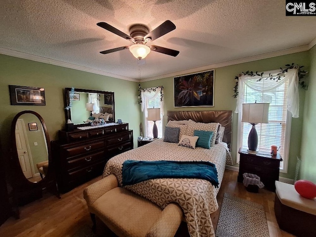 2279TICKLEHIL Tickle Hill Rd, Camden, SC 29020 - bedroom with ornamental molding, wood finished floors, a textured ceiling, and a ceiling fan