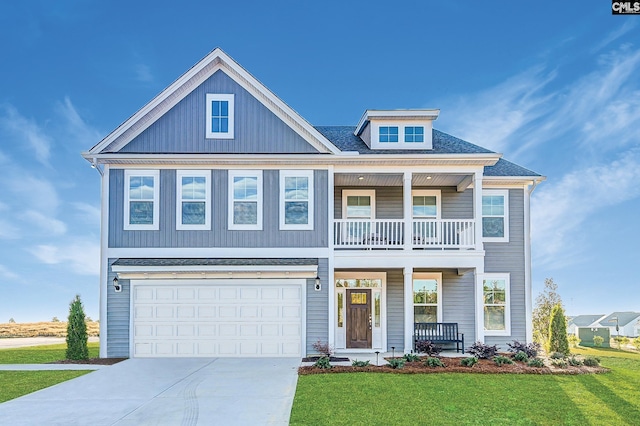 100 Brockway Dr, Columbia, SC 29229 - view of front of house featuring covered porch, concrete driveway, a front yard, and an attached garage