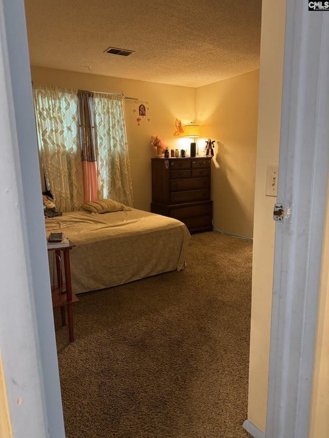 21 Forestgate Ct, Columbia, SC 29212 - bedroom with a textured ceiling and carpet